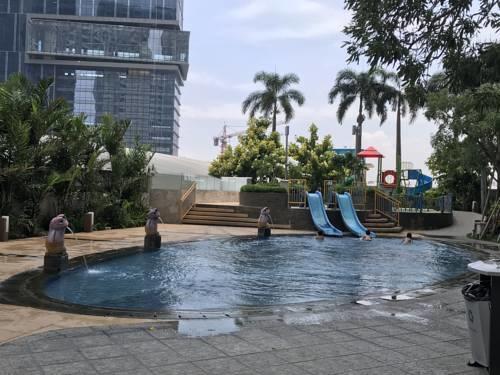 Cosmy Orchard Apartment Surabaya Buitenkant foto