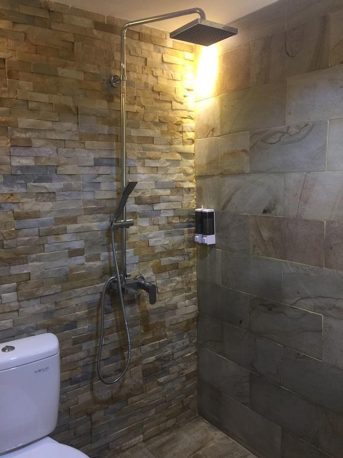 Cosmy Orchard Apartment Surabaya Buitenkant foto